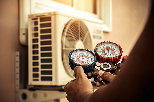 Professional Hvac technician working in Robertsville, NJ